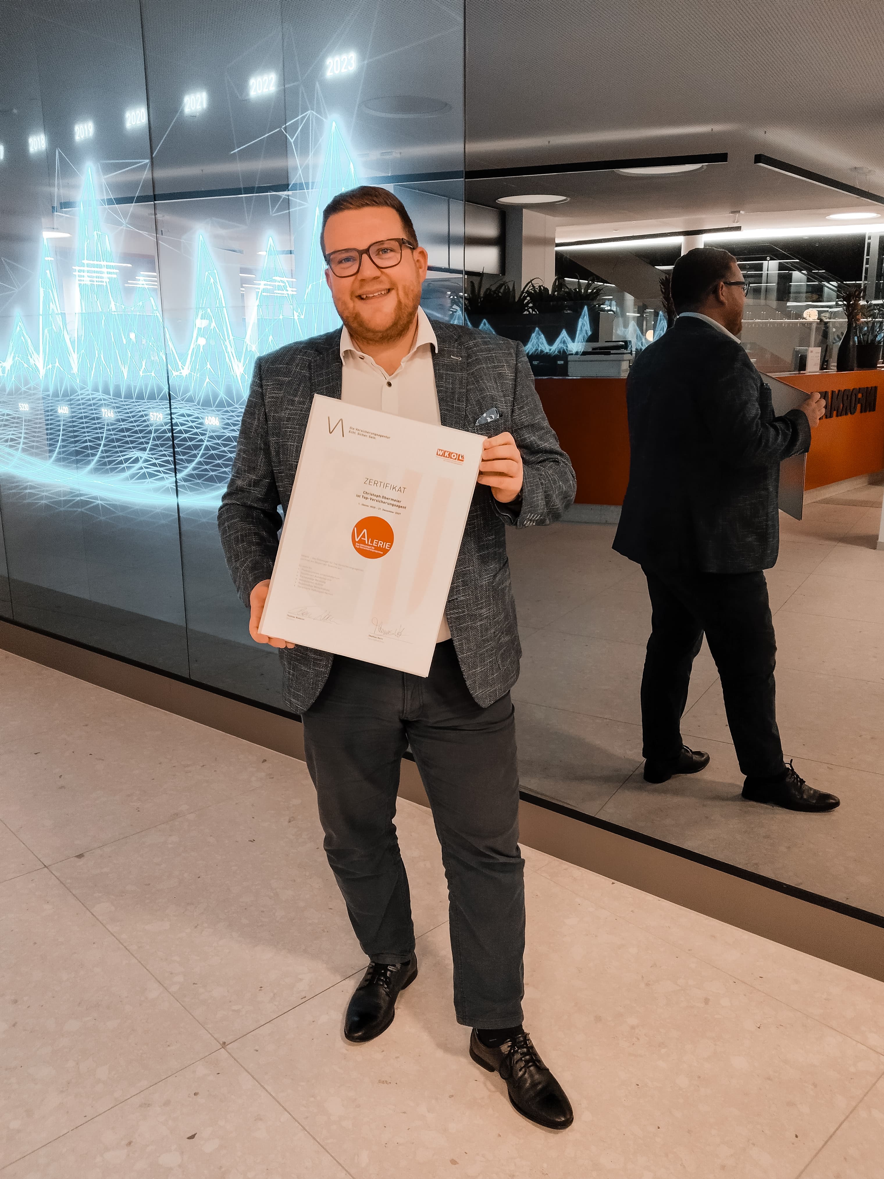 Foto Christoph Obermeier mit Auszeichnung